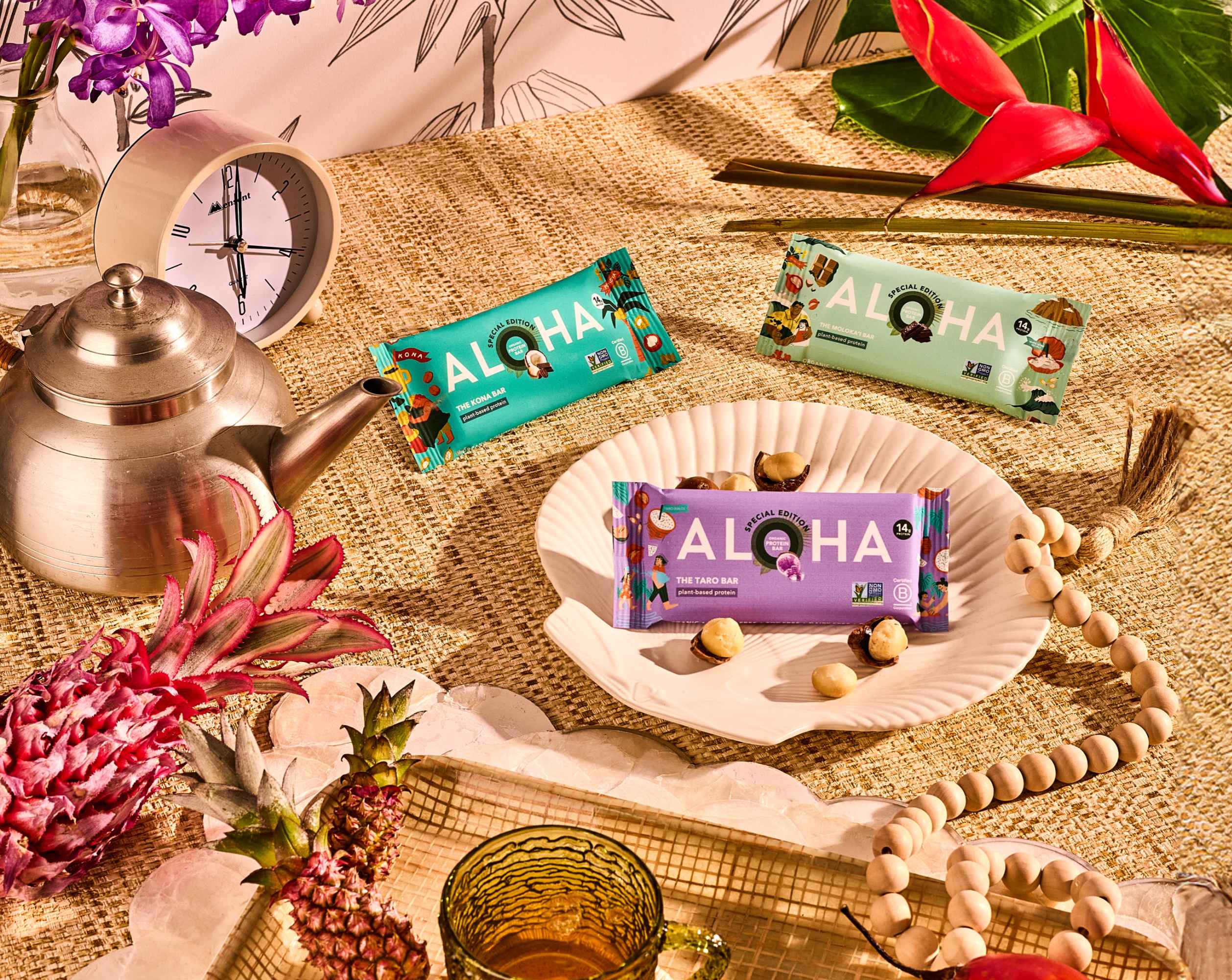 Colorful Aloha snack bars on a decorative, tropical-themed table setting.